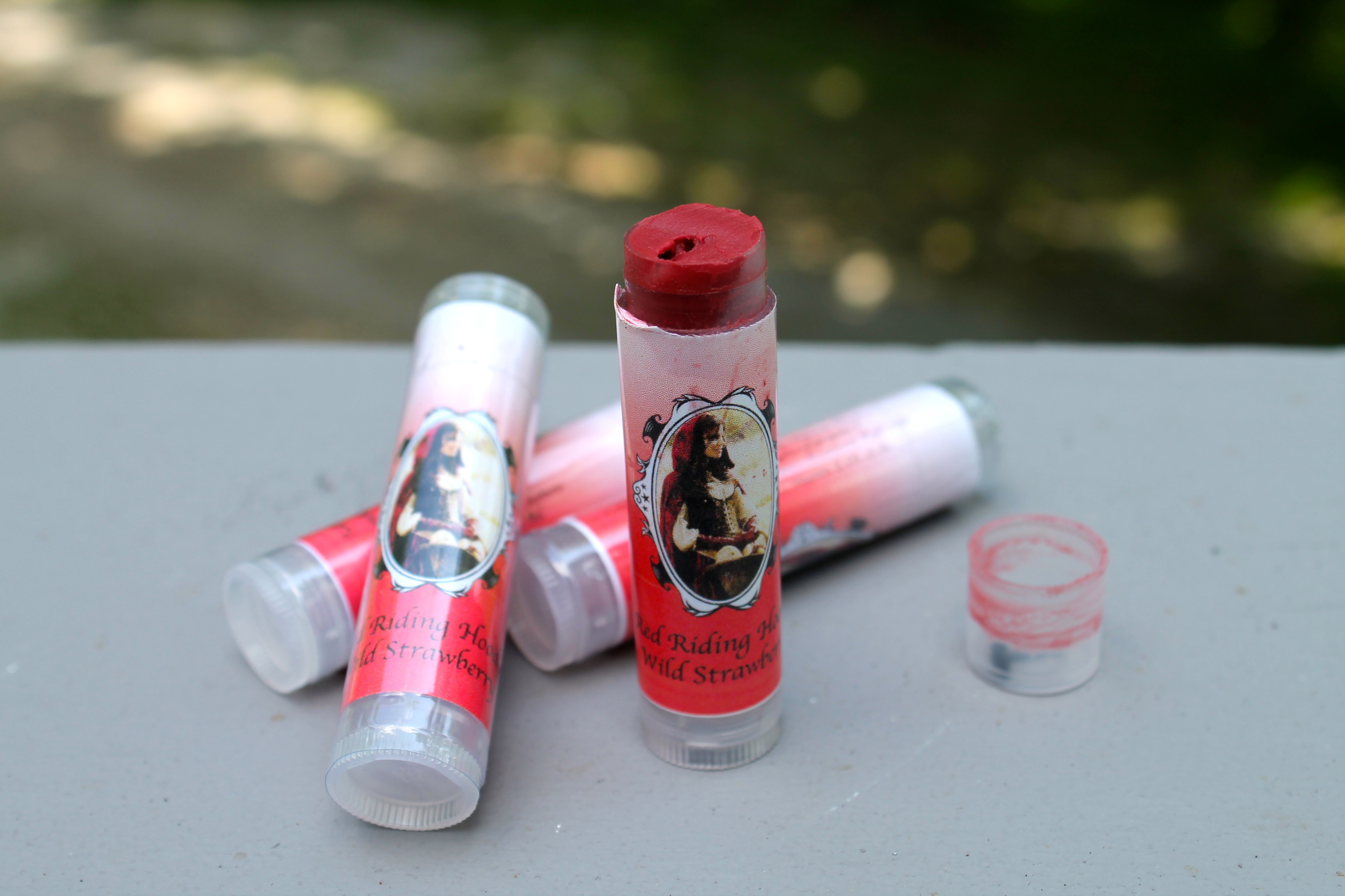 Red Riding Hood's Lip balm in Wild Strawberry with a slight pink tint