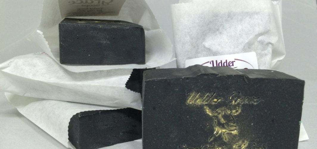 facial soap with goat milk, activated charcoal, neem, and tea tree