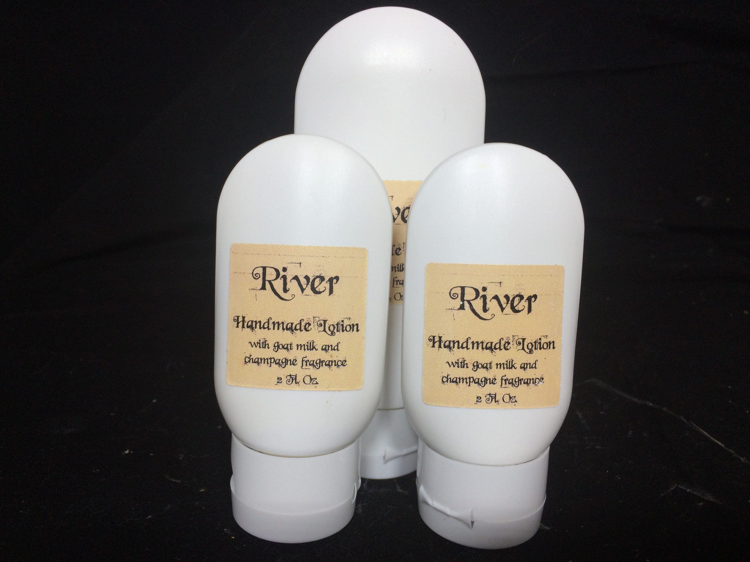 Handmade lotion with goat milk champagne scented river song